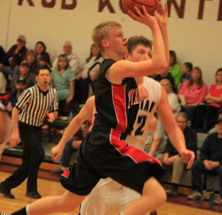 Rhett Schlader puts up a shot against Kamiah during second quarter action.