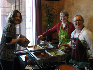 Deanna English, Chris Koehler, and Beth Funk serve delicioussoup at the Empty Bowls benefit on Saturday at the Twisted Cellar. Photos provided by Monastery of St. Gertrude.