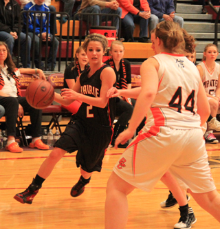 Callie Mader drives towards the hoop against Butte County.