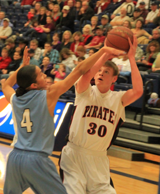 Jake Bruner shoots against Lapwai at District. His tender collarbone kept him out of the Kamiah game. He was expected to be out for Tuesdays game against C.V. as well.