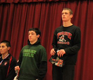 Kade Perrin, right, took first place at 145 lbs.