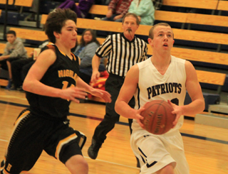 Matthew Schwartz goes for a lay-up on a transition opportunity against Highland.