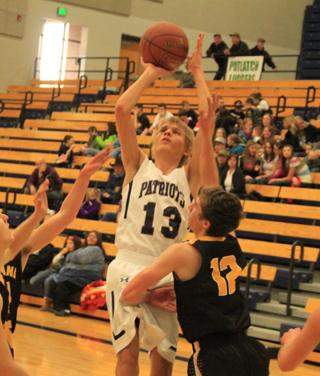 Shane Stubbers scores on a putback against Highland.