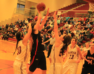 Shelby VonBargen gets a shot up against Kamiah.