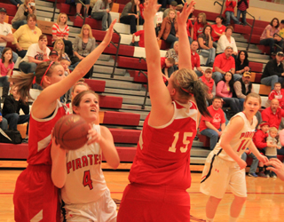 Tanna Schlader looks for an opening for a shot in the Grace game at State.