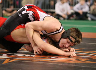 Alex Duman in the state championship match against Levi Perry of Melba.