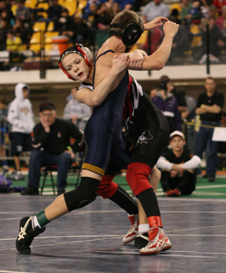 Kellie Heitman tries to take down her second round opponent.