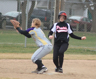 Mackenzie Rieman pulls into second with a double in the second game against Kellogg.