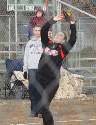 Kenzie Rieman catches a popup at third base in the Genesee game.