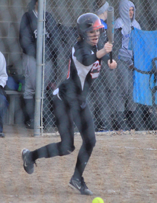 Leah Holthaus tries to bunt her way on against Genesee.