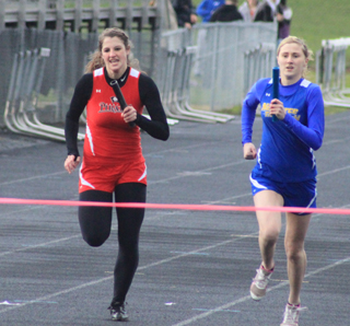 Nezperce and Prairie were neck and neck to the finish of the 4x200 relay with Nezperces runner edging out Prairies Shelby VonBargen.