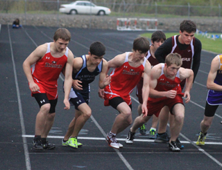 From left for Prairie are Hunter McWilliams, Dylong Bruegeman and Drew Cochran at the start of the 3200.