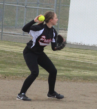 Hailey Danly makes a play at second against C.V. and is about to throw out the batter at first.