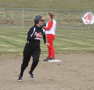 Tanna Schlader races toward third on what turned out to be an inside the park homer against C.V.