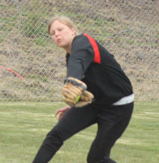 Taylor Nuxoll makes a backhand stab for a catch that cost a Troy hitter at least a double.