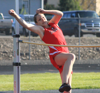 Shayla VonBargen is about to clear the bar in the high jump.