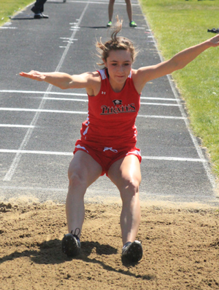 Krystin Uhlenkott landed in the pit with a new personal best mark on this jump at the Area Best Meet.