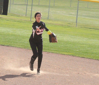 Leah Holthaus, normally Prairie's pitcher, makes a play at second base in the game at Asotin.