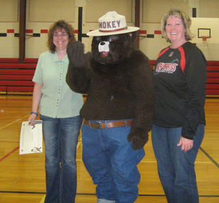 Mrs. Zenner and Mrs. Schu also got to have their pictures taken with Smokey the Bear! All photos on this page by Sherry Holthaus.