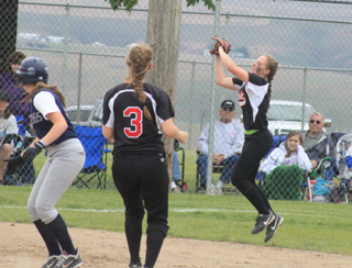Hailey Danly makes a leaping catch of a line drive against Genesee.