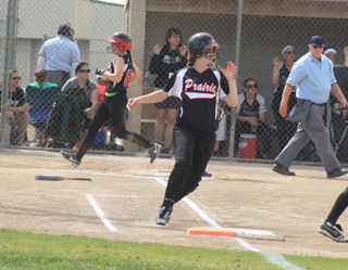 Hailey Danly can be seen scoring the first run against Horseshoe Bend as Tanna Schlader, foreground, singles.