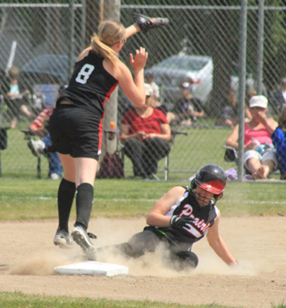 Hailey Danly slides into third with a triple in the first Greenleaf game. She then scored Prairie's first run of that game.