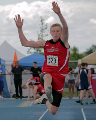 Jake Bruner set a PR to take third in the long jump at state.