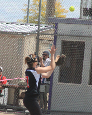 Mackenzie Rieman catches a foul pop-up in the first Greenleaf game.