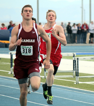 Lucas Arnzen, right, fell one spot short of making the finals in the 400 prelims.