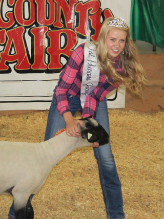 Jacey Arnzen, Idaho County Fair 1st Princess, had the grand champion quality lamb.