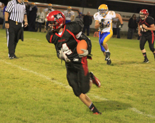 Isaiah Shears was wide open on the left side after catching a pass and wound up taking it 49 yards for a touchdown. At right is Matthew Schwartz.
