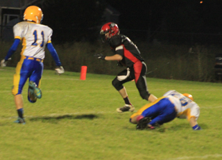 Rhett Schlader jukes away from the defender on the ground and was able to get to the end zone before #11 could make a play on the 1st of his 2 TDs on the night.