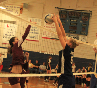 Ally Hale blocks a Kamiah spike at the Grangeville Tournament. She was named to the all-tournament team.
