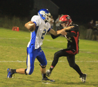 Casey Danly broke through untouched to make this sack of Genesee's quarterback.