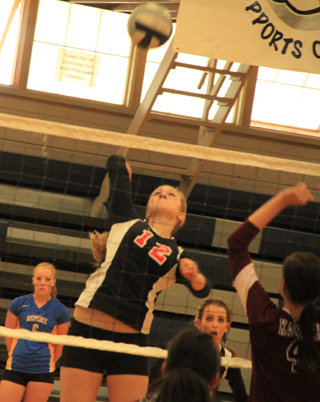 Kayla Schumacher was a force at the net all day long for Prairie.