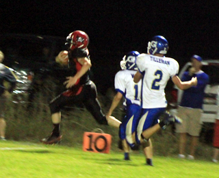 Lucas Arnzen outruns the Genesee defenders on his way to a 35 yard touchdown.