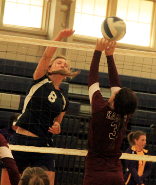 Summits Sarah Chmelik spike the ball against Kamiah at the Grangeville tournament.