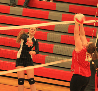 Kayla Schumacher scores a kill at C.V.