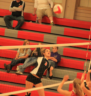 Leah Holthaus goes for the kill at C.V.
