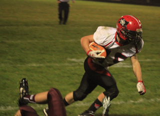 Hunter McWilliams jukes a Kamiah defender off his feet as he makes a big gain on this run.