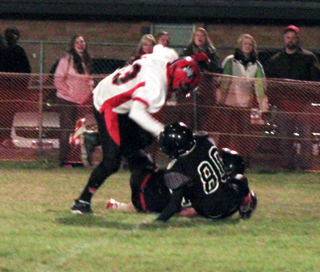 Jake Rowland was able to get away from this would-be tackler for a 30 yard touchdown.