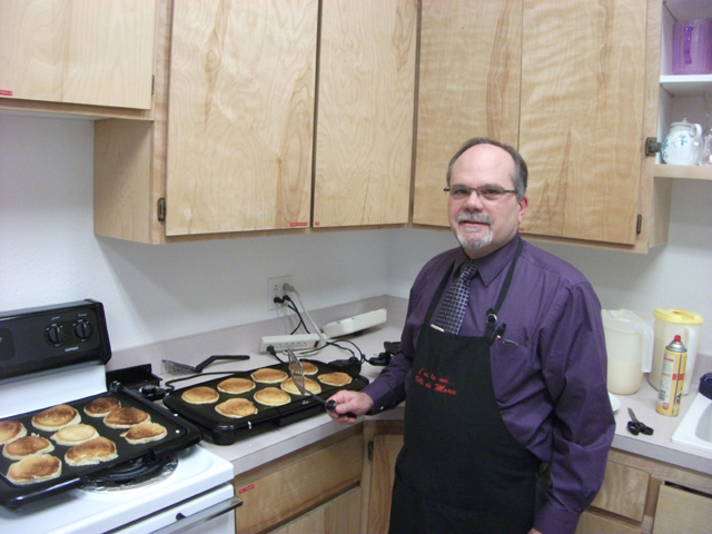 Ally Hale blocks a Logos spike with her teammates arrayed behind her. From left are Rachael Frei, Sarah Chmelik, Megan Seubert and Megan Rehder.