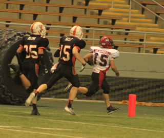 Hunter McWilliams finishes off a long run down the sidelines for a second half touchdown against Troy.