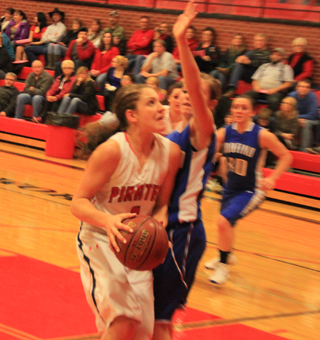 Shayla VonBargen looks to shoot against Orofino.