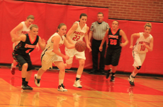 Hailey Danly heads upcourt after a steal against Kendrick. She eventually scored a lay-up on the other end. Also shown are Kayla Schumacher, Kyndahl Ulmer and Leah Holthaus.