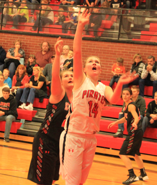 Kayla Schumacher scores 2 of her game-high 17 points against Kendrick. She was an amazing 8 for 9 shooting in the game.