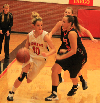 Leah Holthaus drives past a Kendrick defender.
