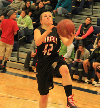 Sky Wilson scores a lay-up that ended a long scoring drought for Prairie in the second quarter.