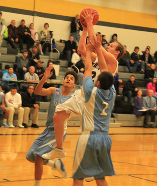 Matthew Schwartz scores a lay-up for Summit against Lapwai.
