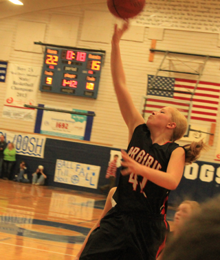 Sky Wilson puts up a 1-handed shot at Grangeville.